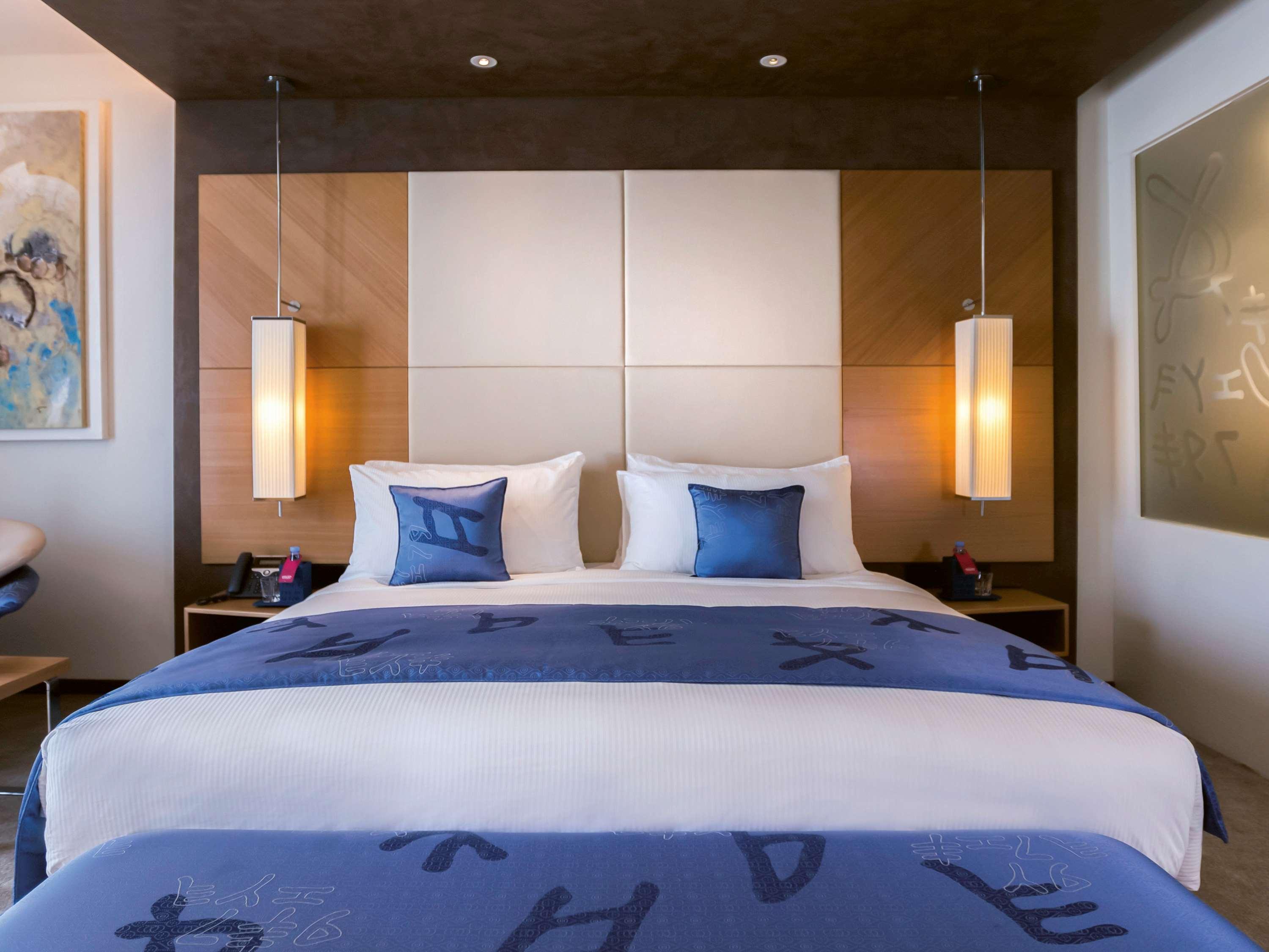 Moevenpick Hotel Du Lac Tunis Luaran gambar A bedroom at the hotel